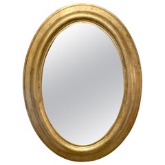 Miroir italien ovale doré antique