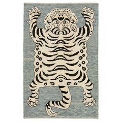 Tapis contemporain en laine grise nouée à la main avec un design de tigre