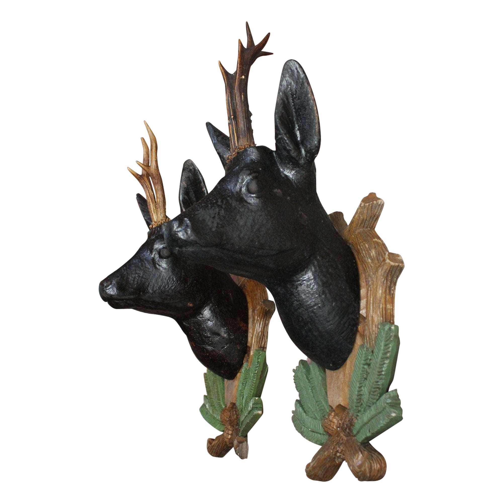 Pair of Vintage German Carved Black Forest Mounted Deer Wall Sculptures For Sale