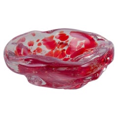 Murano, Italy. Art glass bowl. Clear and red glass with air bubbles inside.