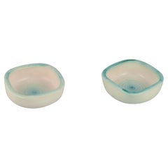 Vintage Elchinger, France. Two ceramic bowls with light-toned glaze.