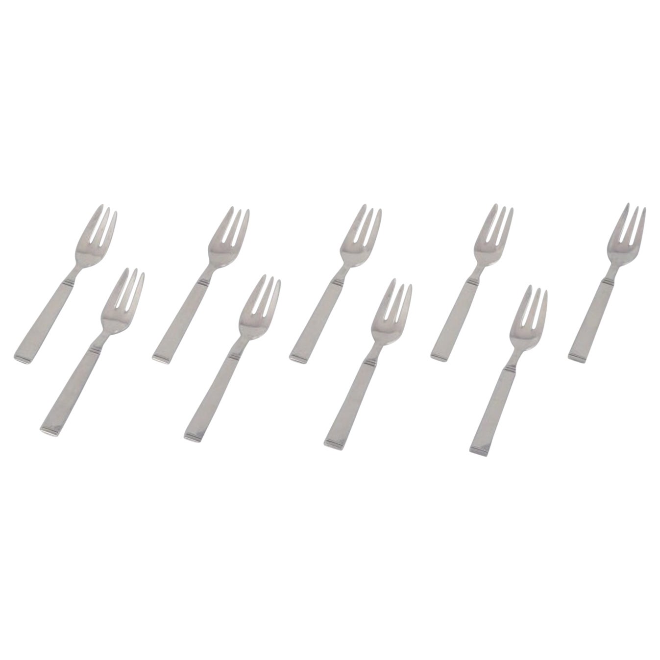 Horsens Sølv. Set of nine Danish pastry forks in 830 silver. Art Deco style.  For Sale