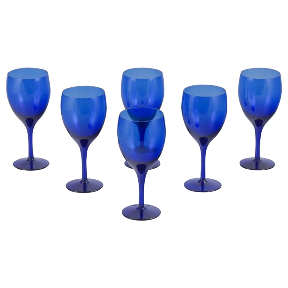 Monica Bratt for Reijmyre. Set of six red wine glasses in blue art glass. For Sale