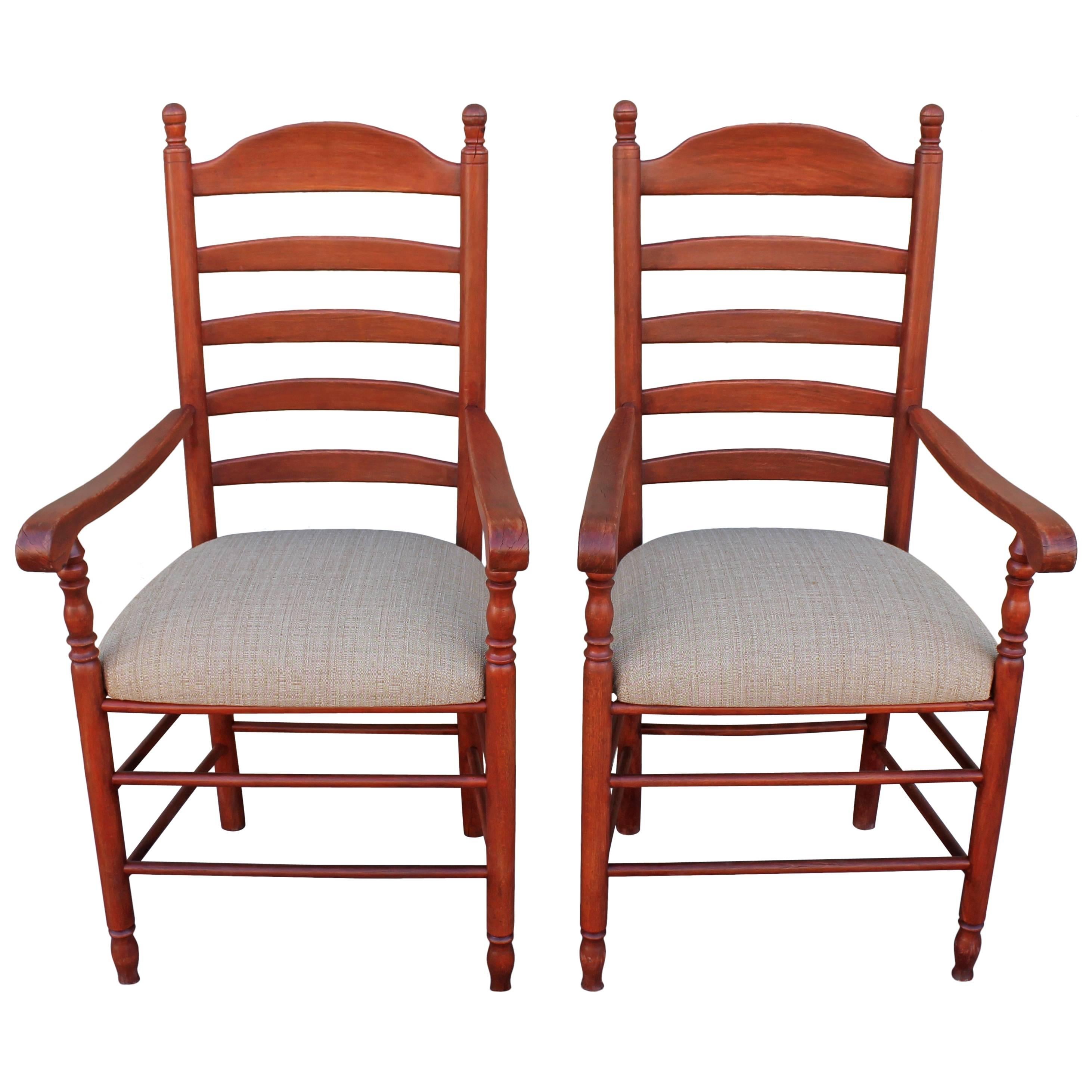Matching Pair of 19th Century N.E. Red Painted Ladder Back Arm Chairs