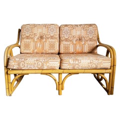 Used Boho Chic Sculpted Bamboo Rattan Loveseat With Patterned Tufted Cushions