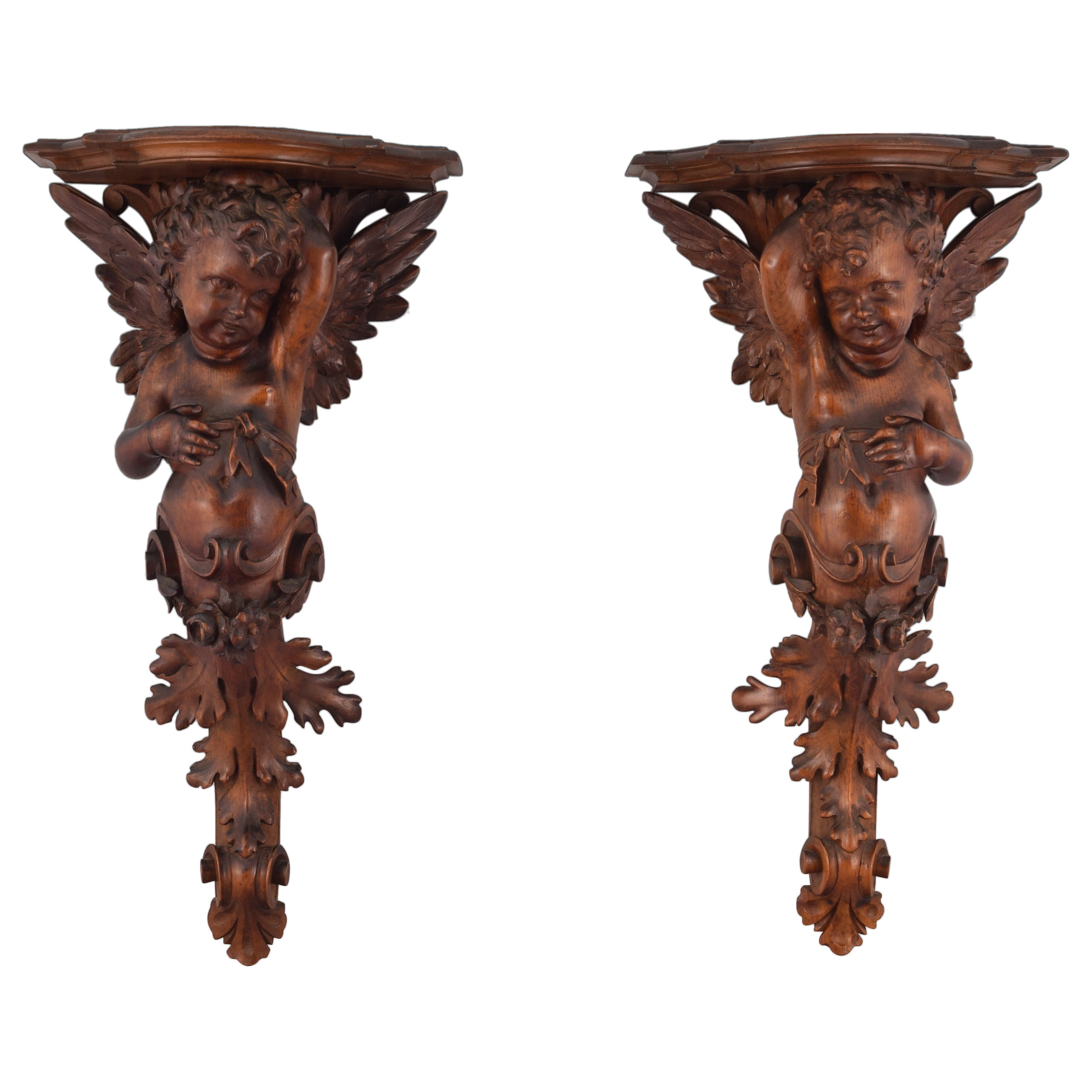 Pair of carved wooden corbels. Venice, 19th century. 