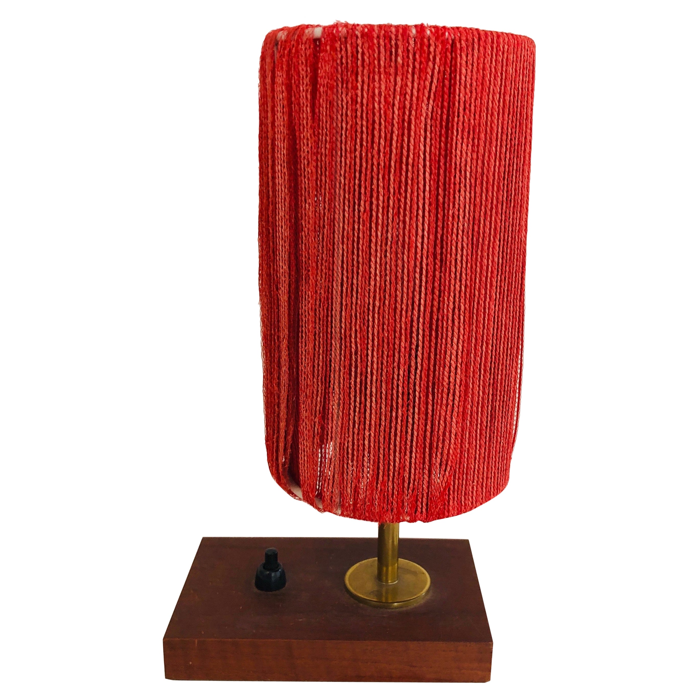 Piccola lampada da tavolo in legno, ottone e lana