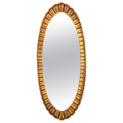 Grand miroir ovale Sunburst Giltwood de Francisco Hurtado