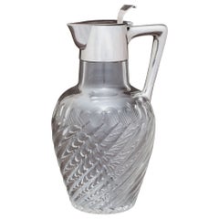 Cruche à claret en verre taillé, garnie d'argent, vers 1905