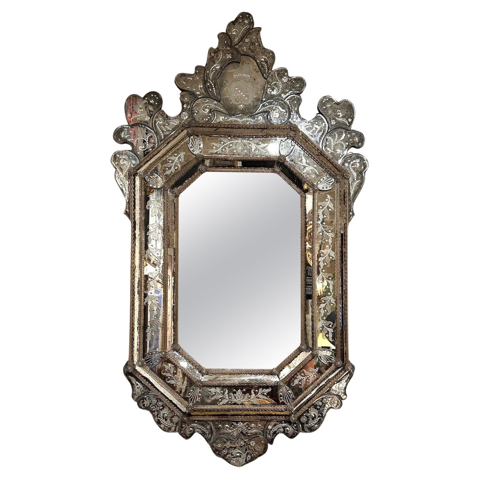 How do you clean a Venetian mirror?
