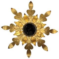 Backlit Gilt Iron Sunburst or Flower Burst Mirror in Two Gold Tones