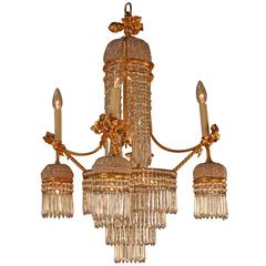 Elegant Crystal and Doré Bronze Chandelier.