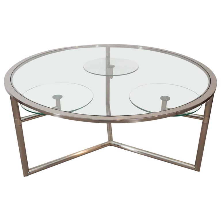 Vintage Chrome and Glass Cocktail Table with Swivels For Sale at 1stdibs