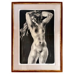 Impression en noir et blanc d'un nu féminin, signée au crayon et numérotée 58/150