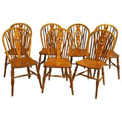 Set of Seven Late 19th Century Ash and Elm Wheel-Back Chairs