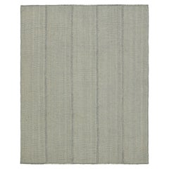Rug & Kilim’s Contemporary Kilim in Blue and Gray Textural Stripes