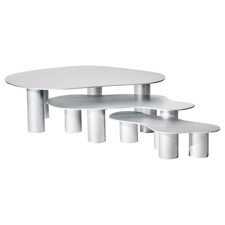 Puddle aluminum nesting tables, new