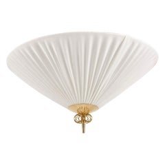 A flush mount lighting  Paavo Tynell,  model K5-26.