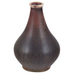 Bengt Ekeblad for Rörstrand. Miniature ceramic vase with brown glaze. 1964