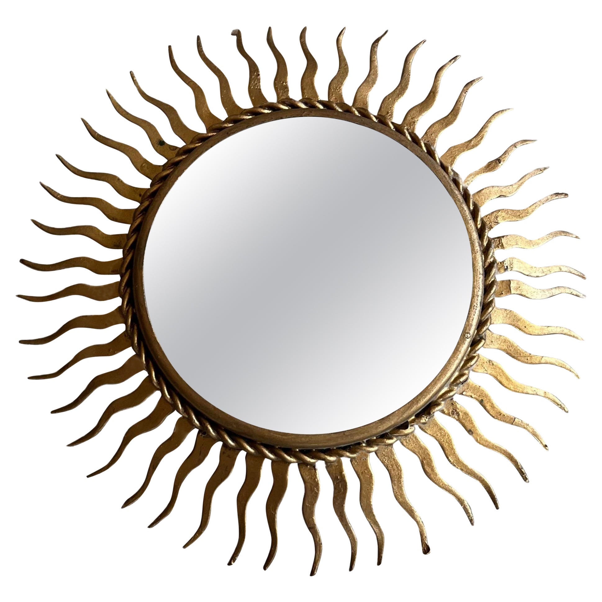 Small French gilt metal starburst mirror