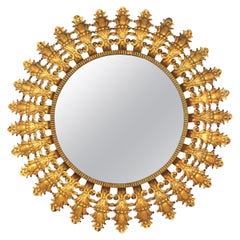 Vintage Spanish Hollywood Regency Sunburst Mirror in Gilt Iron, 1950s