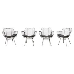 Siglo XXI Juego de cuatro sillones de comedor Woodard Sculptura Garden