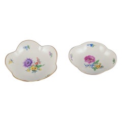 Meissen, Germany. Two porcelain bowls hand-painted with polychrome flowers. 