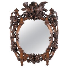 Antique 19th Century Swiss 'Black Forest' Hand-Carved Walnut Wall Mirror