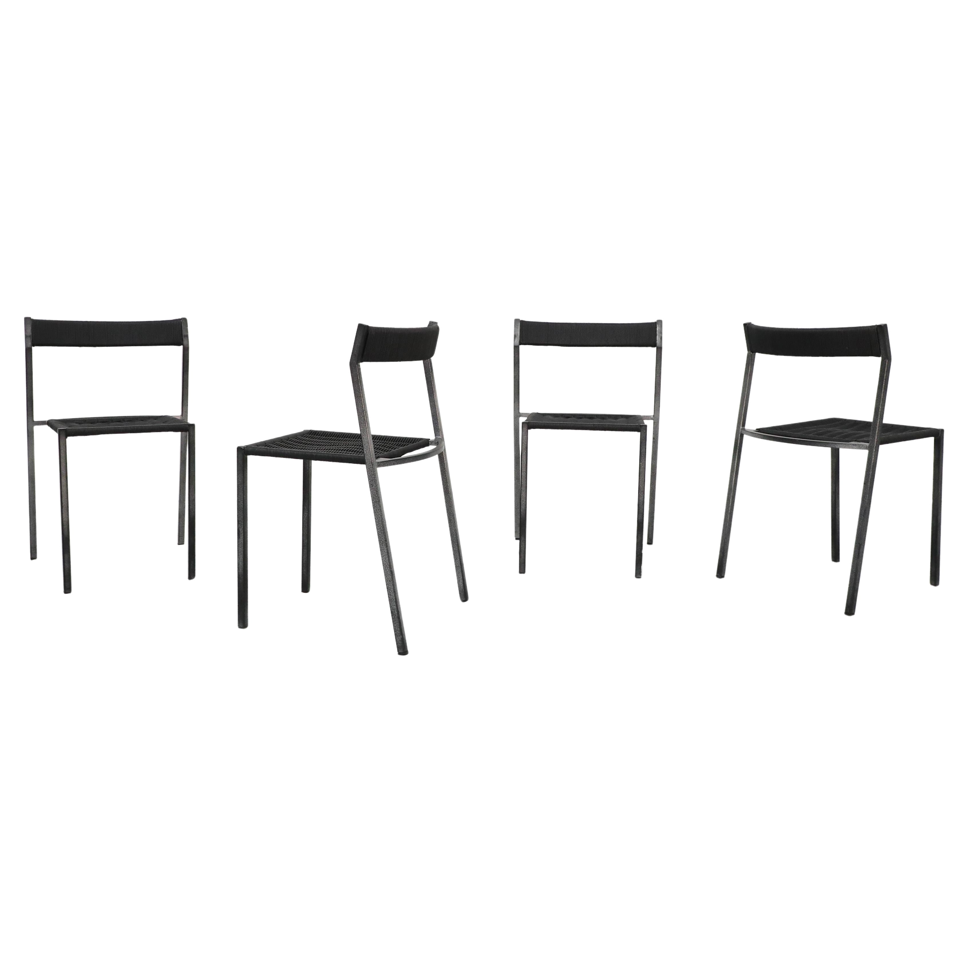Set of Four 1960s Rohe Noordwolde Black Rattan and Metal Dining Chairs