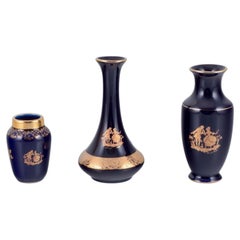 Vintage Limoges, France. Three small porcelain vases decorated with 22-karat gold leaf