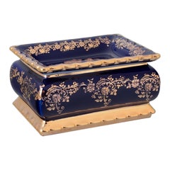 Vintage Limoges, France. Porcelain covered box decorated with 22-karat gold leaf.