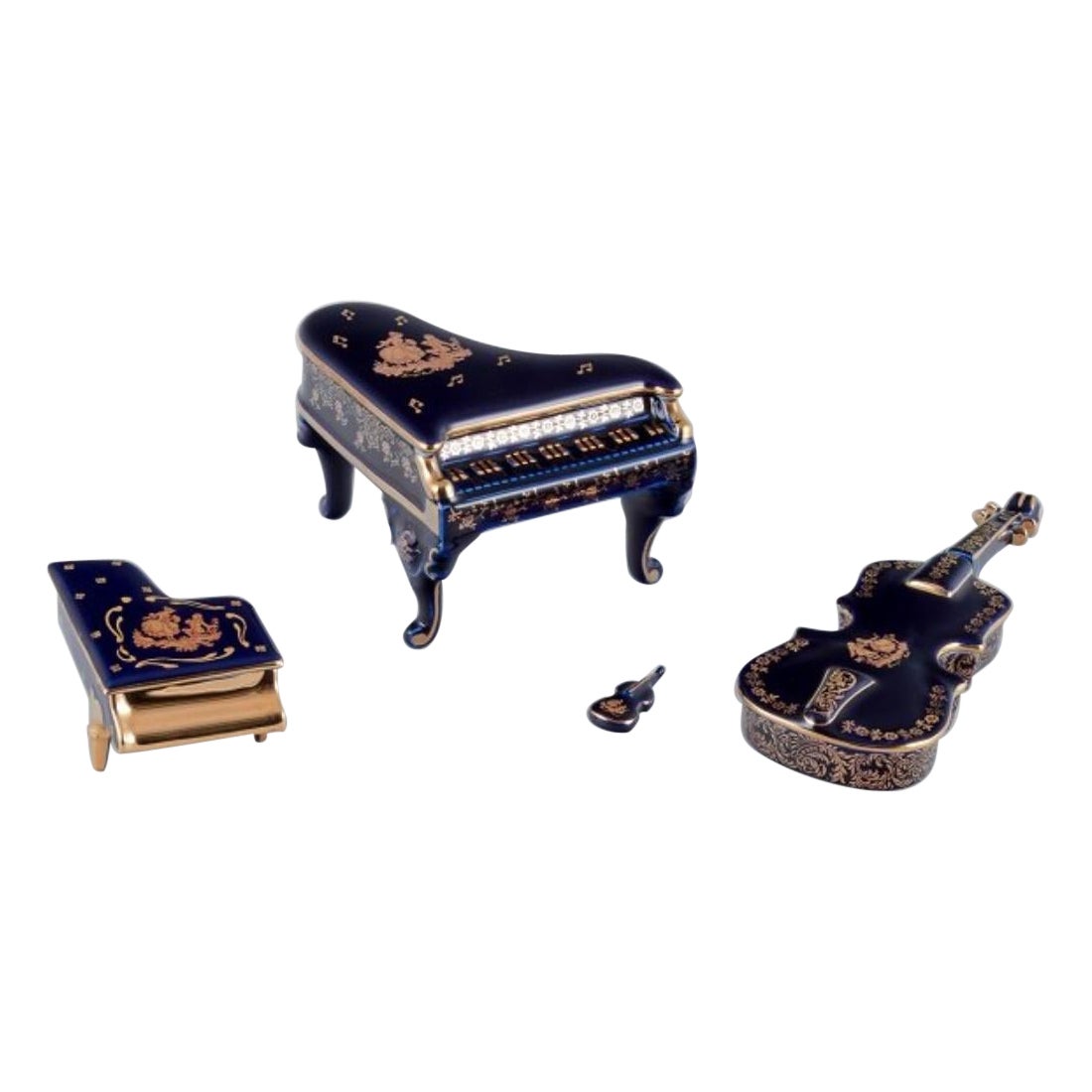 Limoges, Francia. Cuatro instrumentos musicales de porcelana, años 70