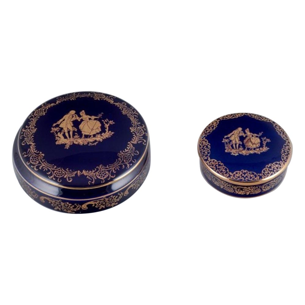 Limoges, Francia. Dos tarros/cajas redondos con tapa de porcelana. en venta