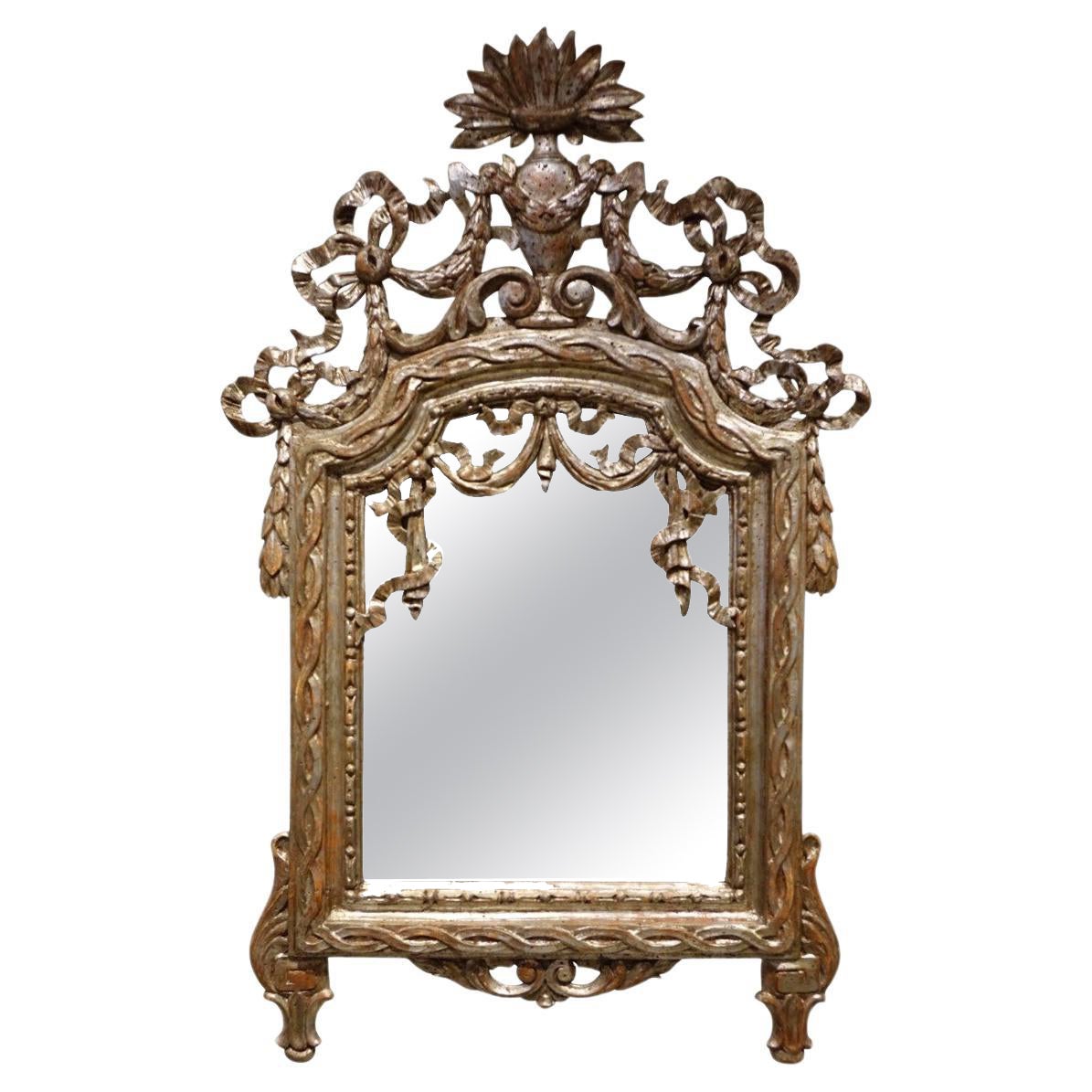Specchio del XVIII secolo in legno intagliato e argentato