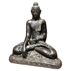 19th Century or earlier Carved Buddha decorated with jewelry
