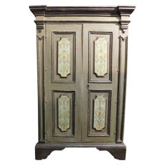 Antique Double-door wardrobe in carved and painted wood, Italy