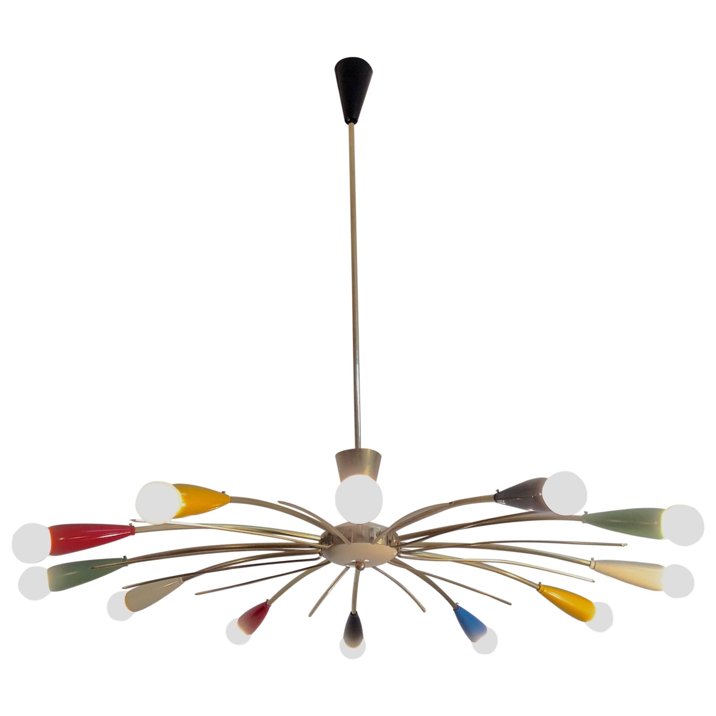 High quality Italian manufactured Sputnik / sunburst chandelier with multicolored cones and brass body. Nice details.