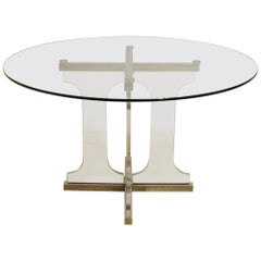 Used Pedestal table, plexiglass and stainless steel legs, glass top, circa 1970.
