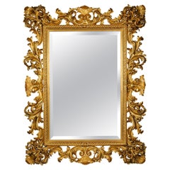 Großer und beeindruckender Spiegel aus geschnitztem Giltwood im Barockstil