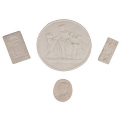 Four plaster wall reliefs. Approx. 1900