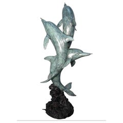 Fontaine de jardin en bronze avec dauphins