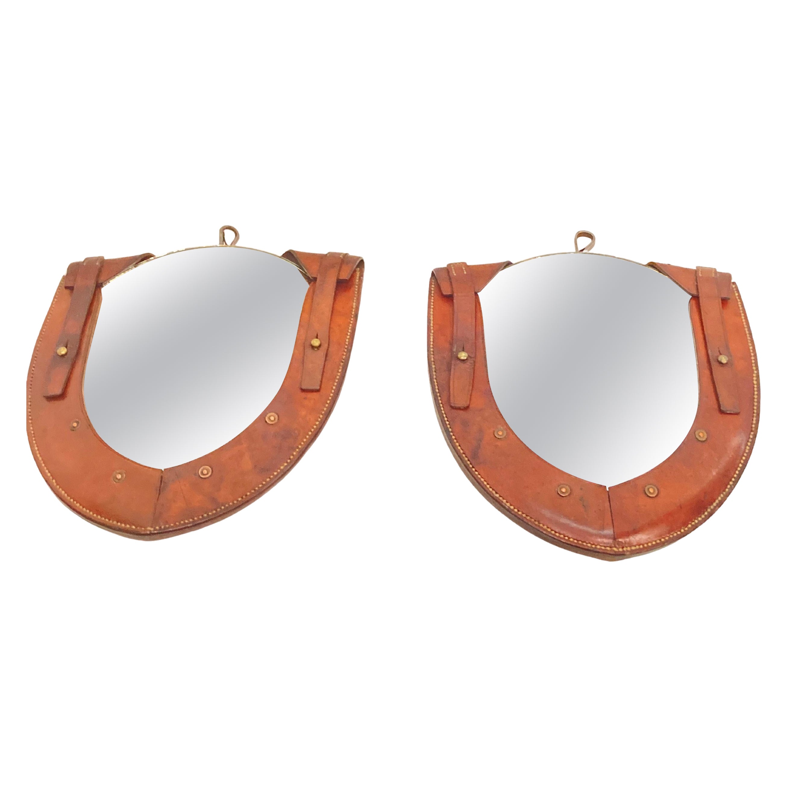 Pair of wall stitched mirror in the style of Jacques Adnet
