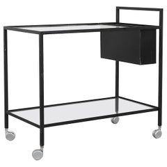 Herbert Hirche Carrito de bar rodante de metal negro con estantes de cristal y portabotellas