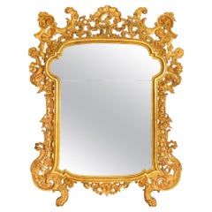 Circa 1760 Italian Rococo Giltwood Wall Mirror, probably Milan, 71” H x 56” W