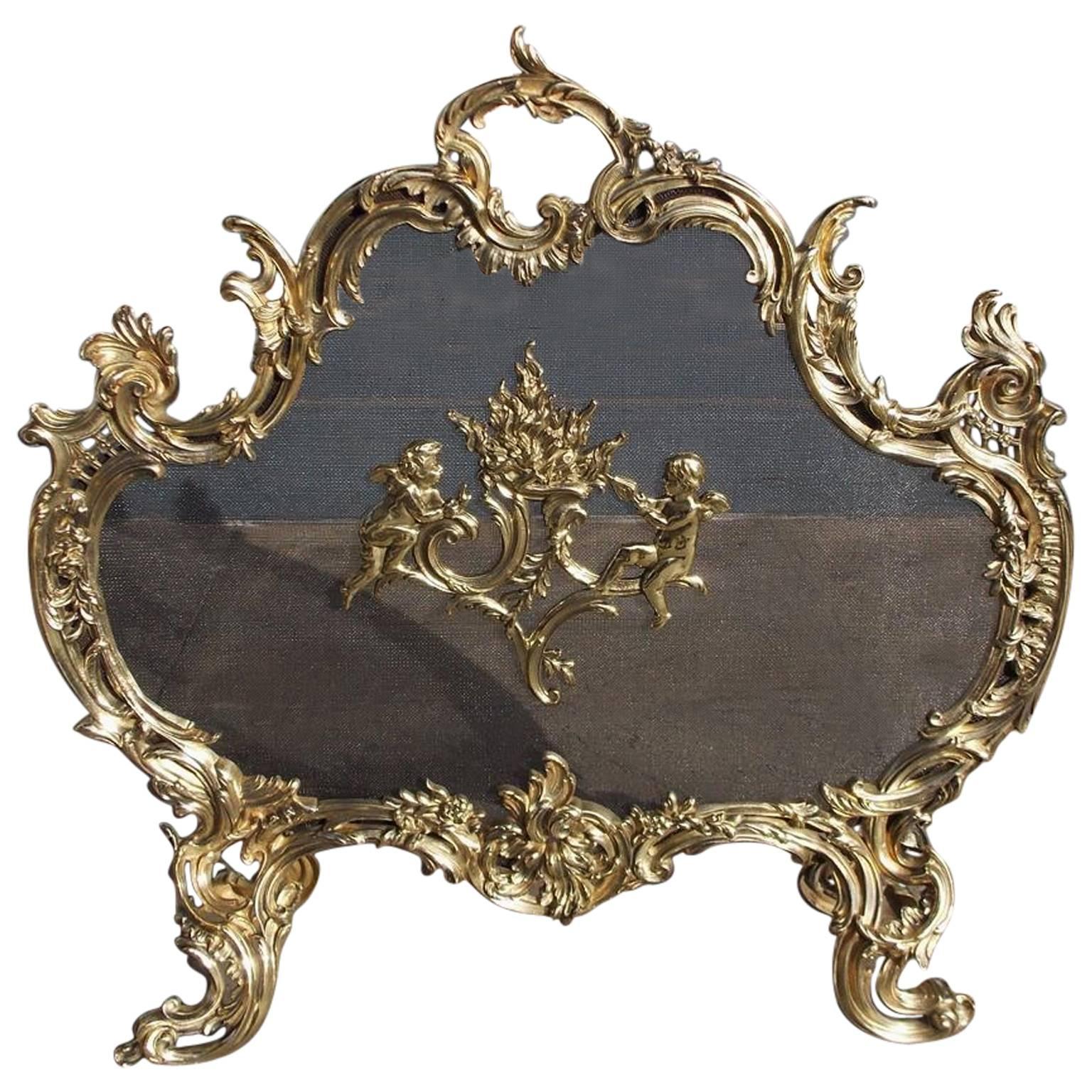 French Brass Cherub and Floral Free Standing Fire Screen, Circa 1820  For Sale