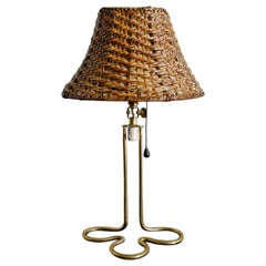 Mauri Almari Mid Century Brass Rattan Table Lamp Produced by Idman Finland 1950s
