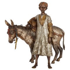 Antique Orientalist Cold-Painted Bronze Sculpture of a Boy and a Donkey by Bergman