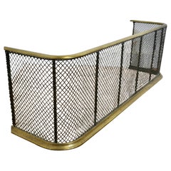 A Victorian Brass and Iron Fender or Fire Guard A Victorian antique fire guard