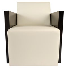 Sillón Estambul, tapicería de piel de primera calidad con estructura lacada en negro piano