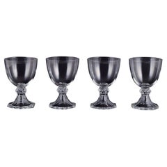 Val St. Lambert, Belgium. Set of four wine glasses in clear crystal glass.